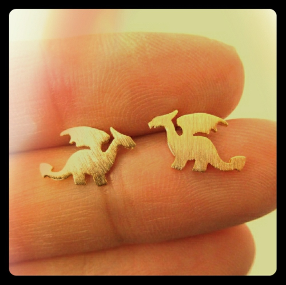 ^Gold or silver dragon earrings